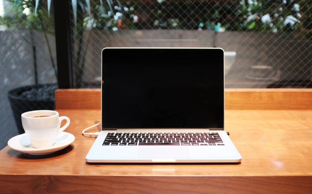 computer with coffee